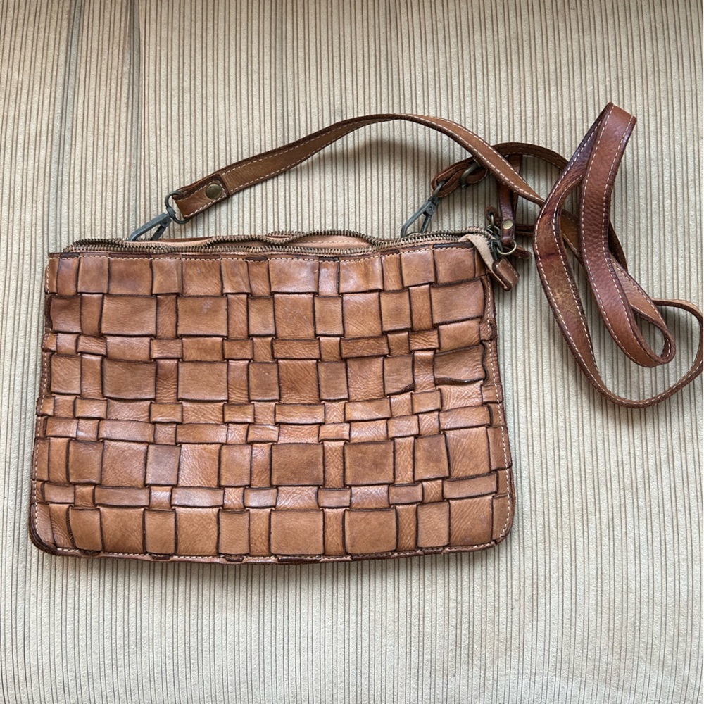 Genuine leather cross body woven bag. Dual compartment.